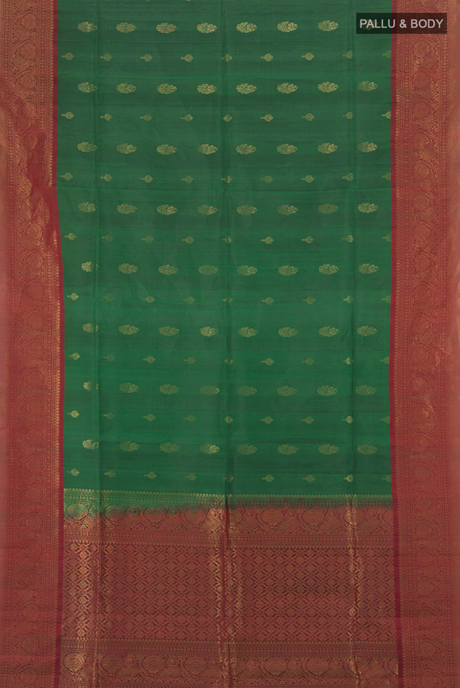 Flat view of Bottle Green Soft Silk Saree with Zari Brocade on the body and Silk Border. 