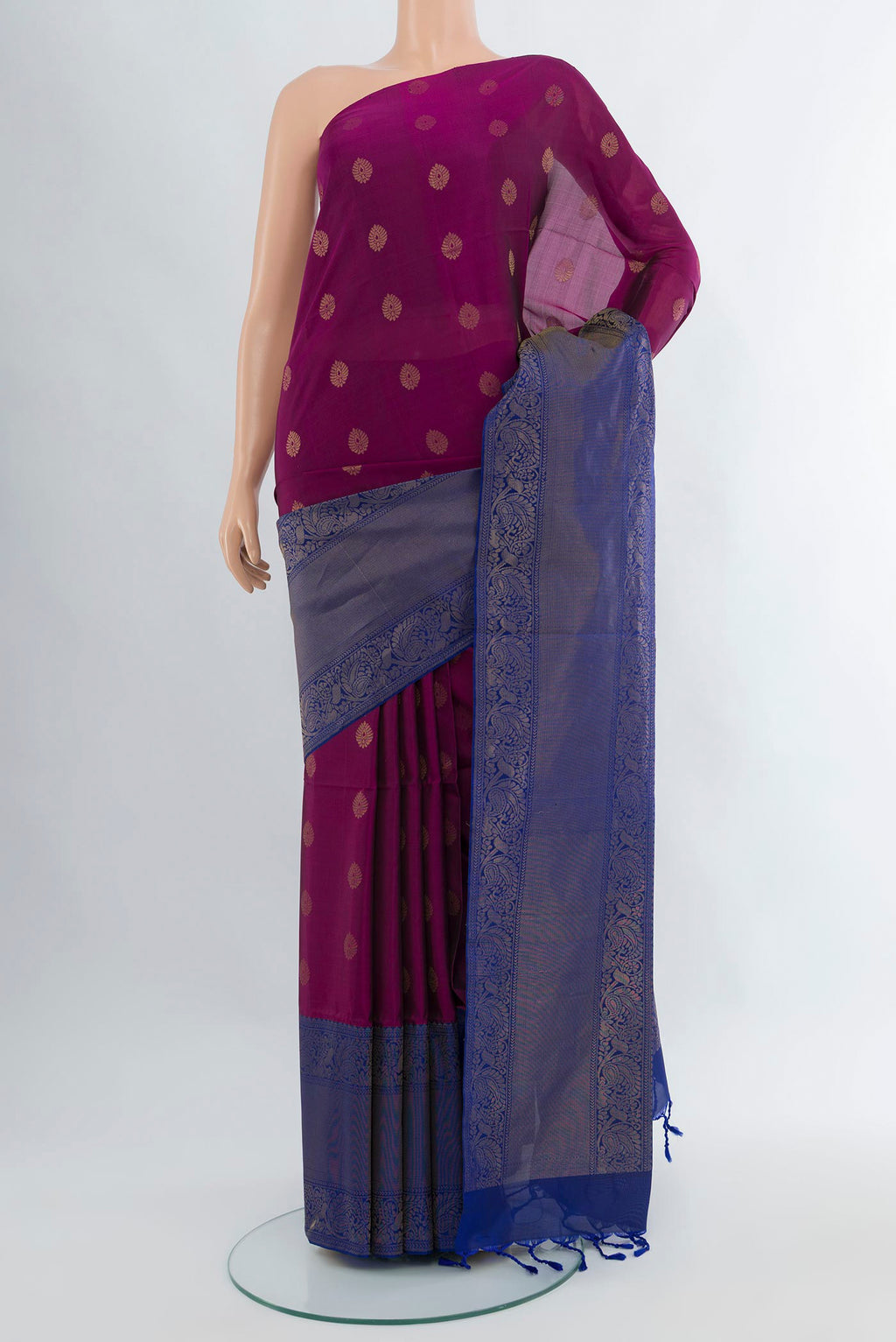 Purple Soft Silk Saree with Zari Butta on the body and One Side Border.  displayed on a mannequin