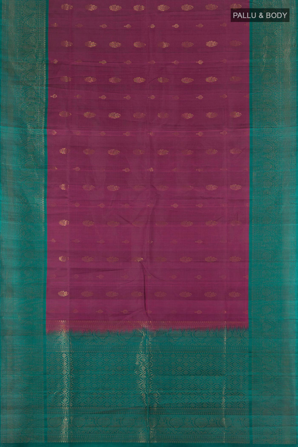Flat view of Pure Silk Purple Soft Saree with Zari Butta on the body and Fancy Border. 