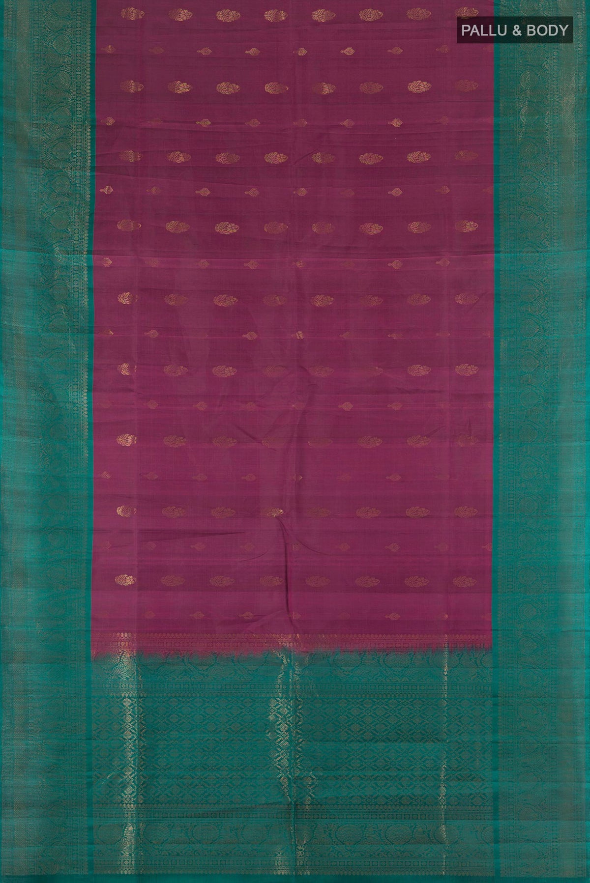 Flat view of Pure Silk Purple Soft Saree with Zari Butta on the body and Fancy Border. 