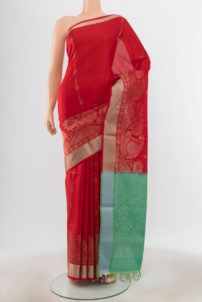 Red Soft Silk Saree with Zari Butta on the body and Silk Border.  displayed on a mannequin