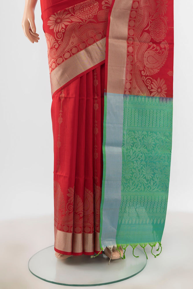 Pleats and pallu of Red Soft Silk Saree with Zari Butta on the body and Silk Border. 