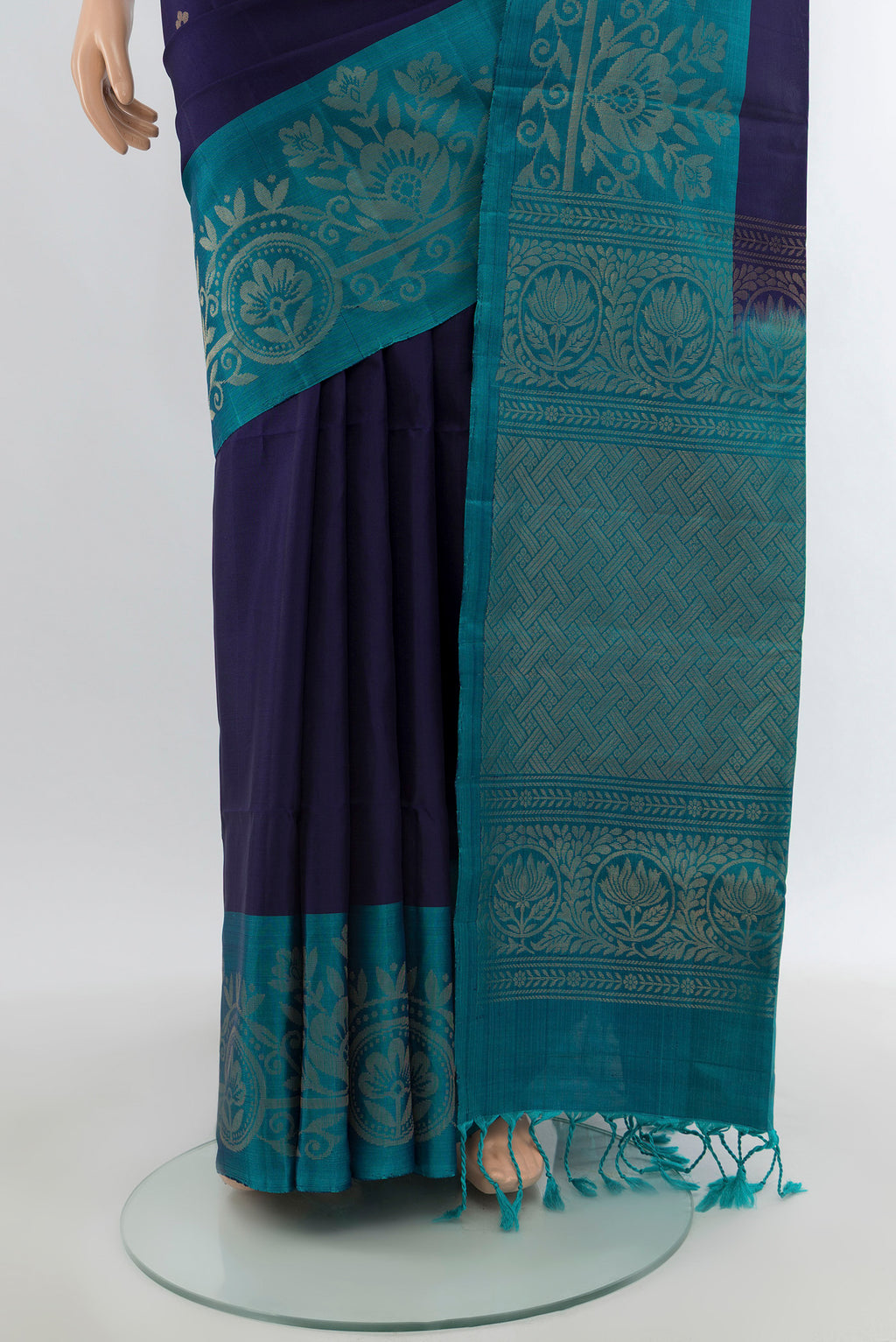 Pleats and pallu of Navy Blue Soft Silk Saree with Zari Butta on the body and Fancy Border. 