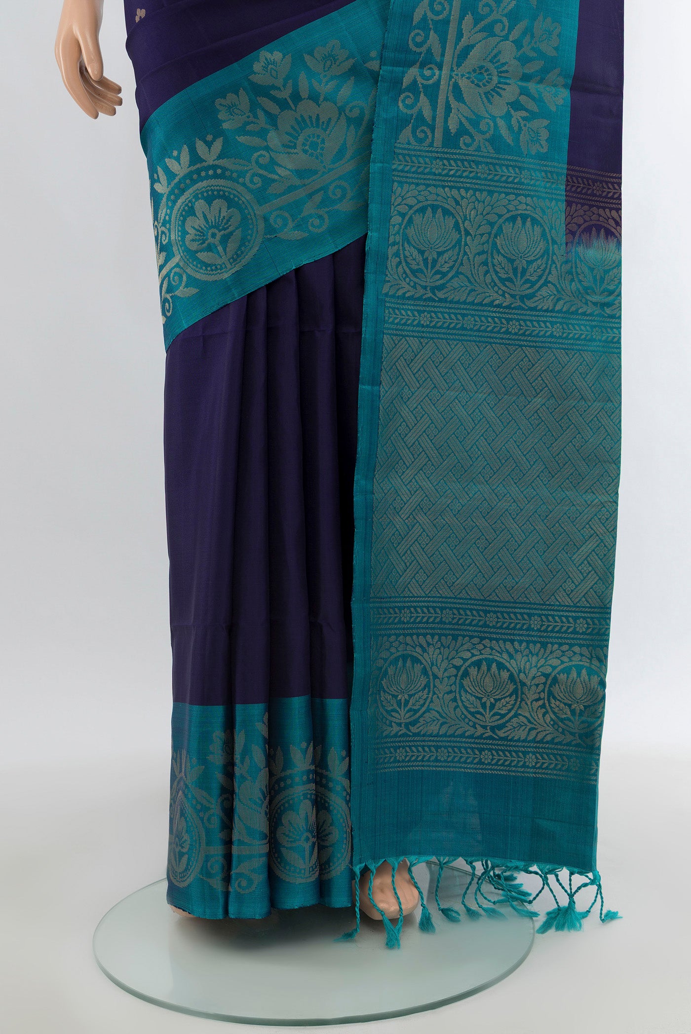 Pleats and pallu of Navy Blue Soft Silk Saree with Zari Butta on the body and Fancy Border. 