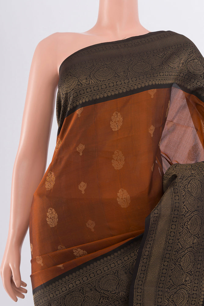 Border image of Rust Soft Silk Saree with Zari Butta on the body and Silk Border. 