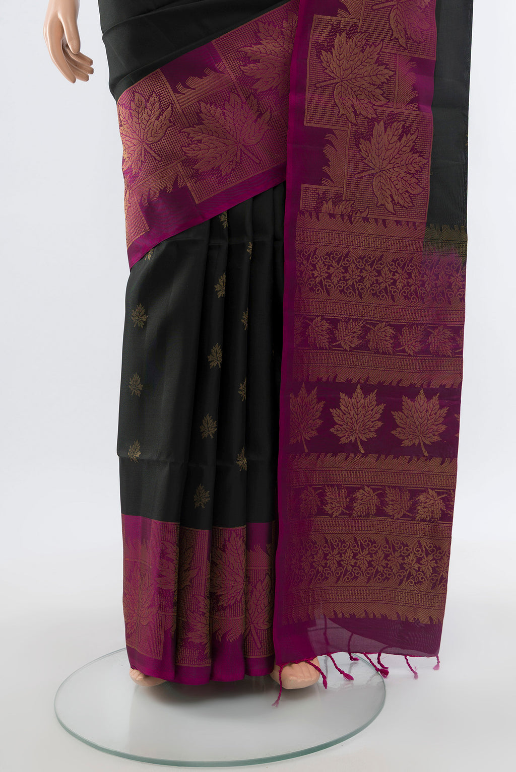 Pleats and pallu of Coffee Brown Soft Silk Saree with Zari Butta on the body and Silk Border. 