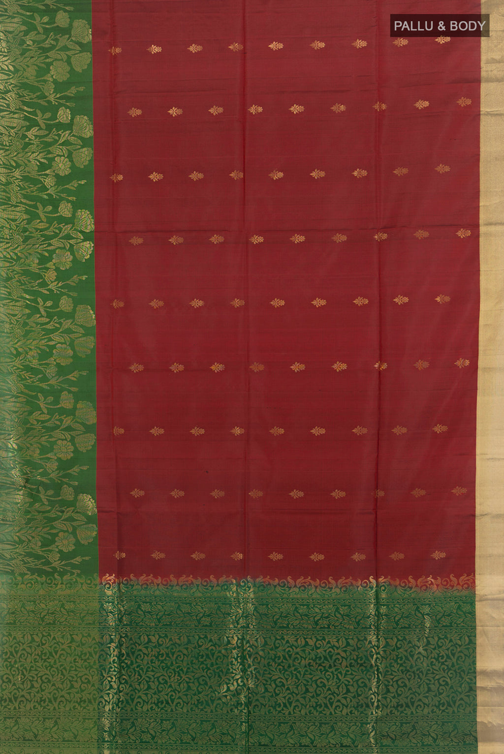 Flat view of Maroon Soft Silk Saree with Zari Butta on the body and Zari Border. 