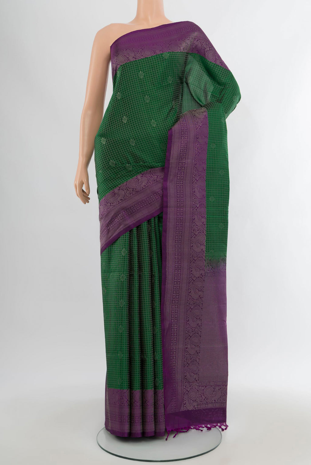 Bottle Green Soft Silk Saree with Checked design on the body and Zari Border.  displayed on a mannequin