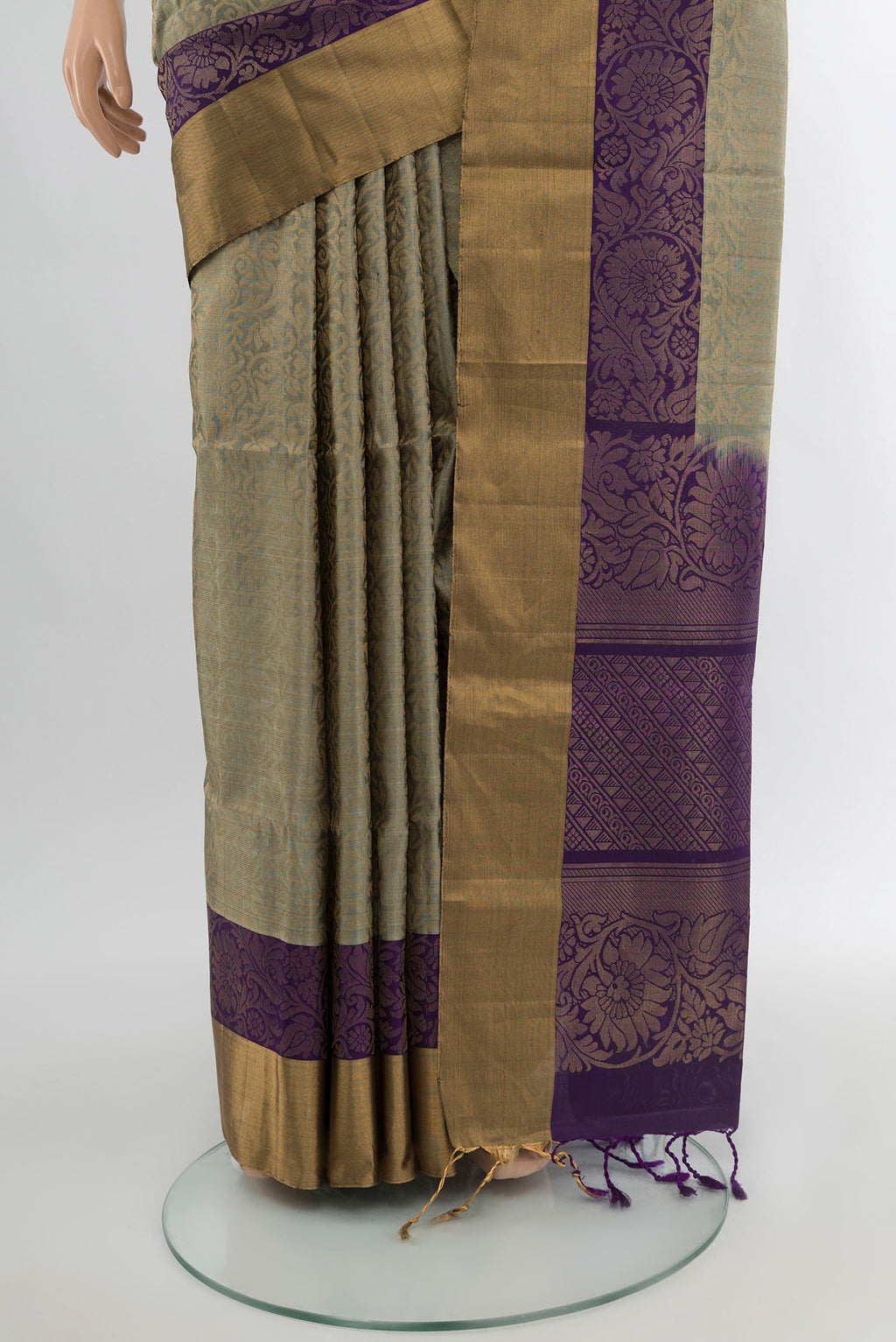 Pleats and pallu of Grey Soft Silk Saree with Zari Butta on the body and Silk Border. 