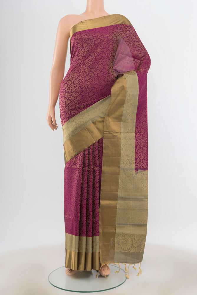 Purple Soft Silk Saree with Zari Butta on the body and Silk Border.  displayed on a mannequin