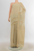 Pure Silk Beige Soft Saree with Zari Butta on the body and Zari Border.  displayed on a mannequin