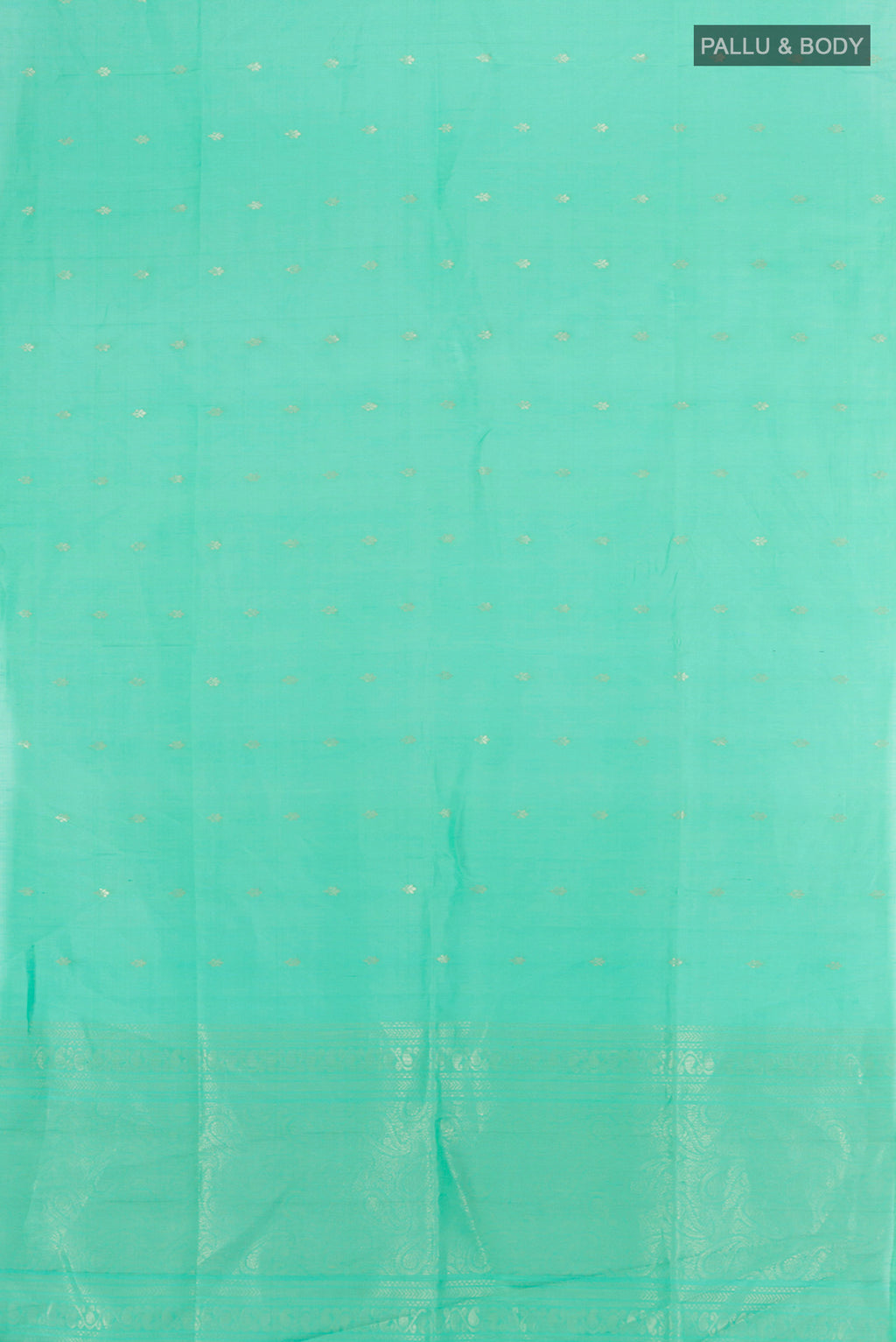 Flat view of Sky Blue Soft Silk Saree with Zari Butta on the body and Silk Border. 