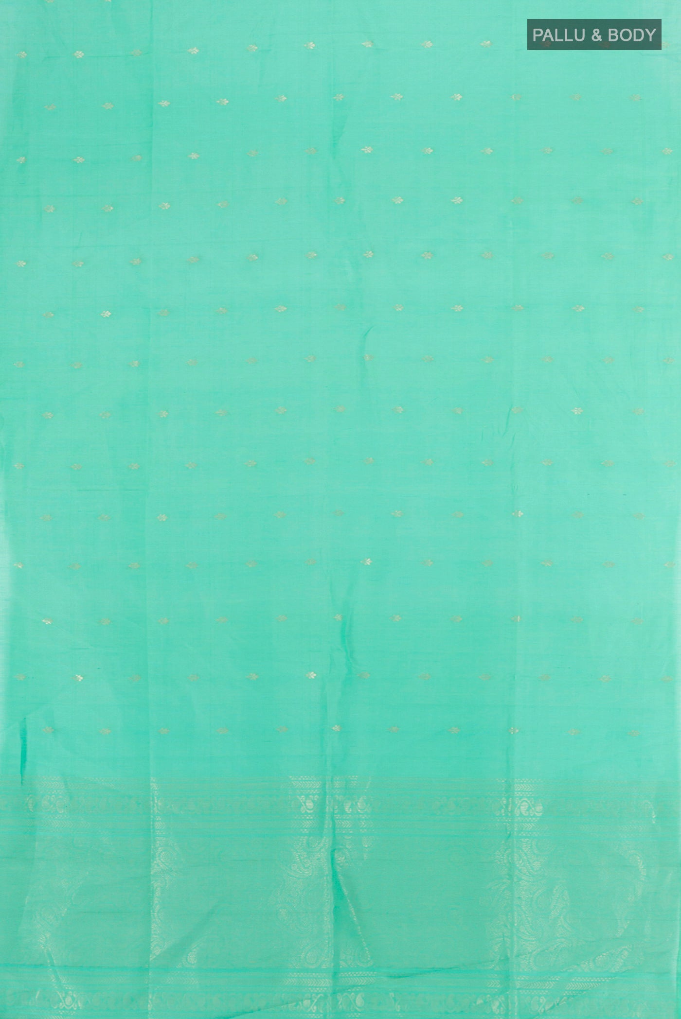 Flat view of Sky Blue Soft Silk Saree with Zari Butta on the body and Silk Border. 
