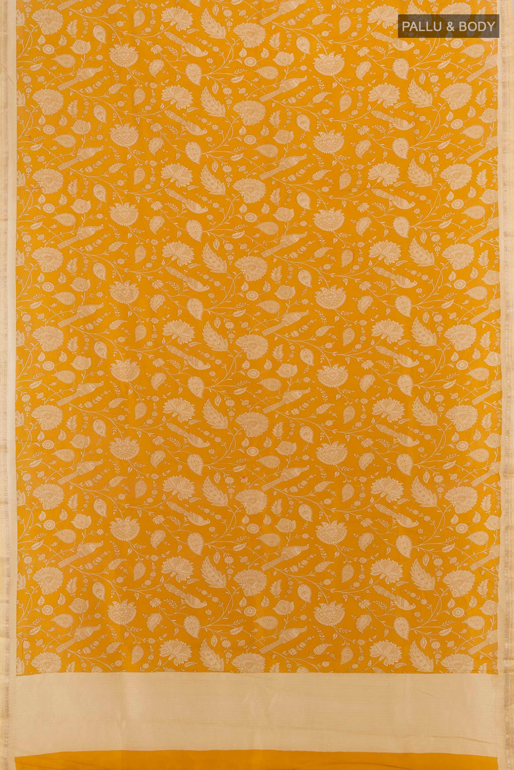 Flat view of Mustard Maheshwari Silk Cotton Saree with Floral Print on the body and Zari Border. 