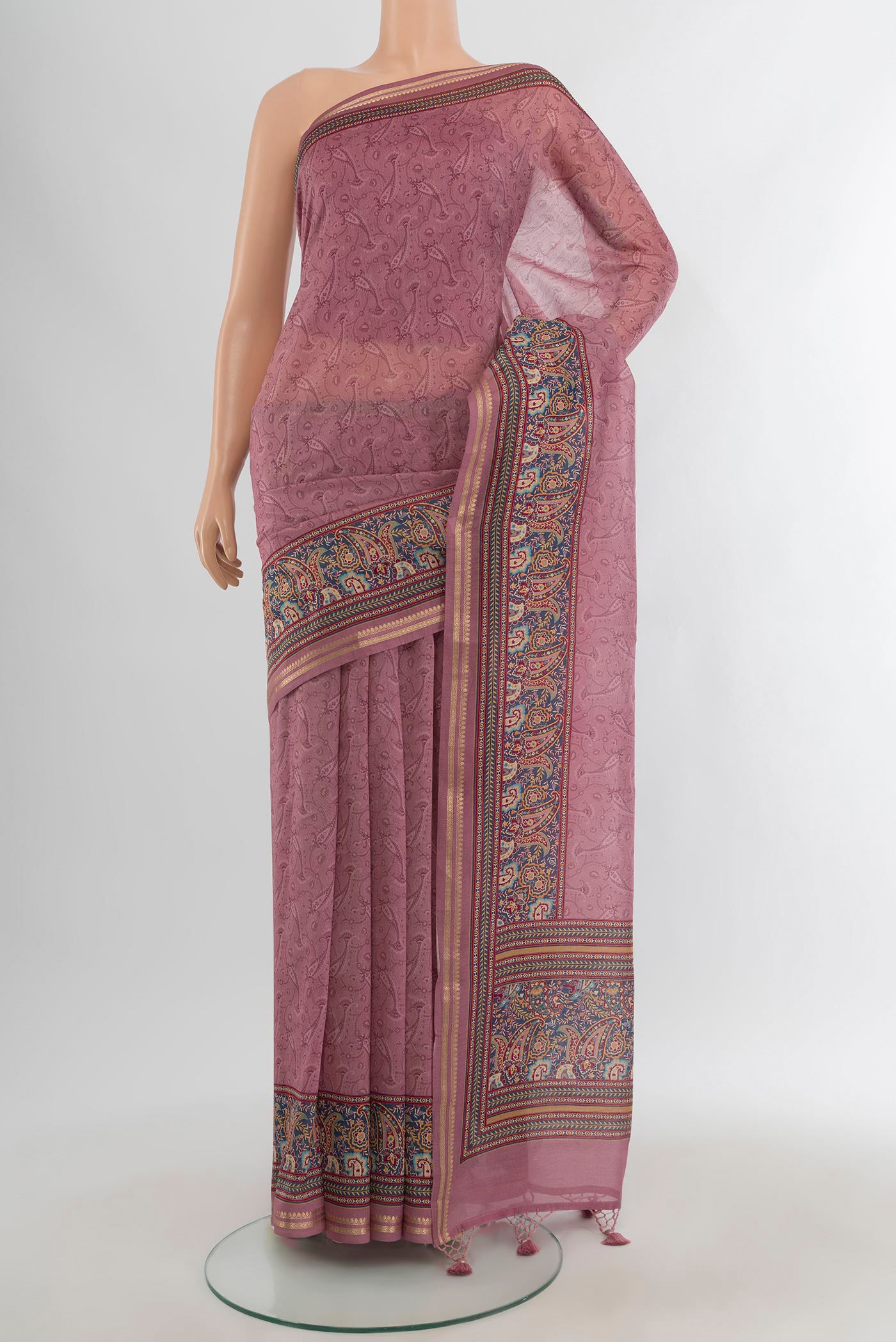 Mauve Maheshwari Silk Cotton Saree with Floral Print on the body and Plain Border.  displayed on a mannequin