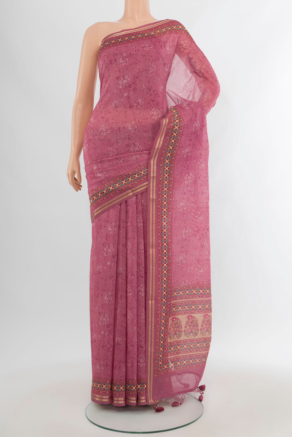 Pink Chanderi Silk Cotton Saree with Printed design on the body and Zari Border.  displayed on a mannequin