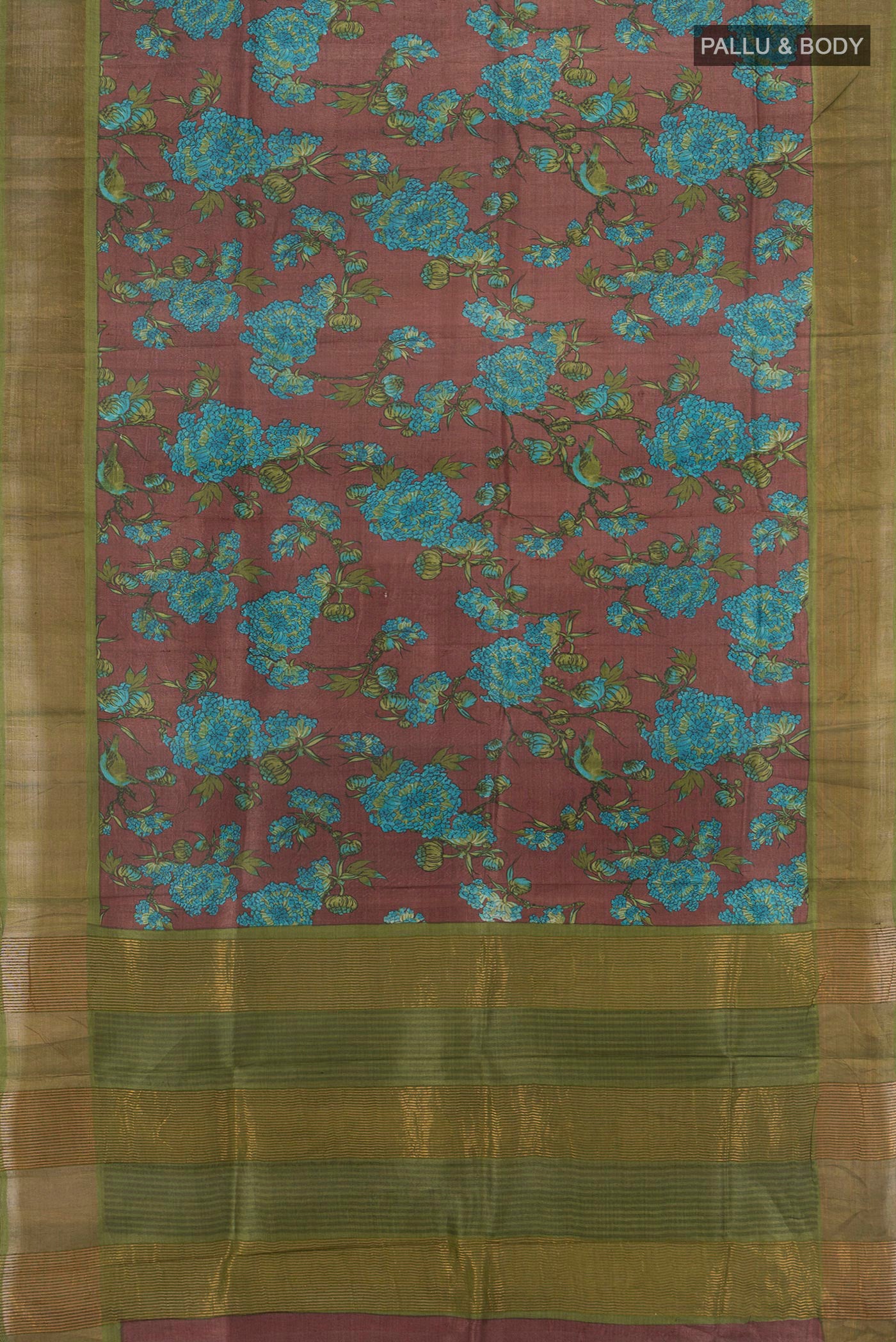 Flat view of Brown Tussar Silk Saree with Floral Print on the body and Zari Border. 