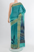 Multi Color Tussar Silk Saree with Floral Print on the body and Silk Border.  displayed on a mannequin