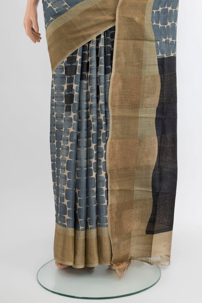 Pleats and pallu of Multi Color Tussar Silk Saree with Floral Print on the body and Silk Border. 