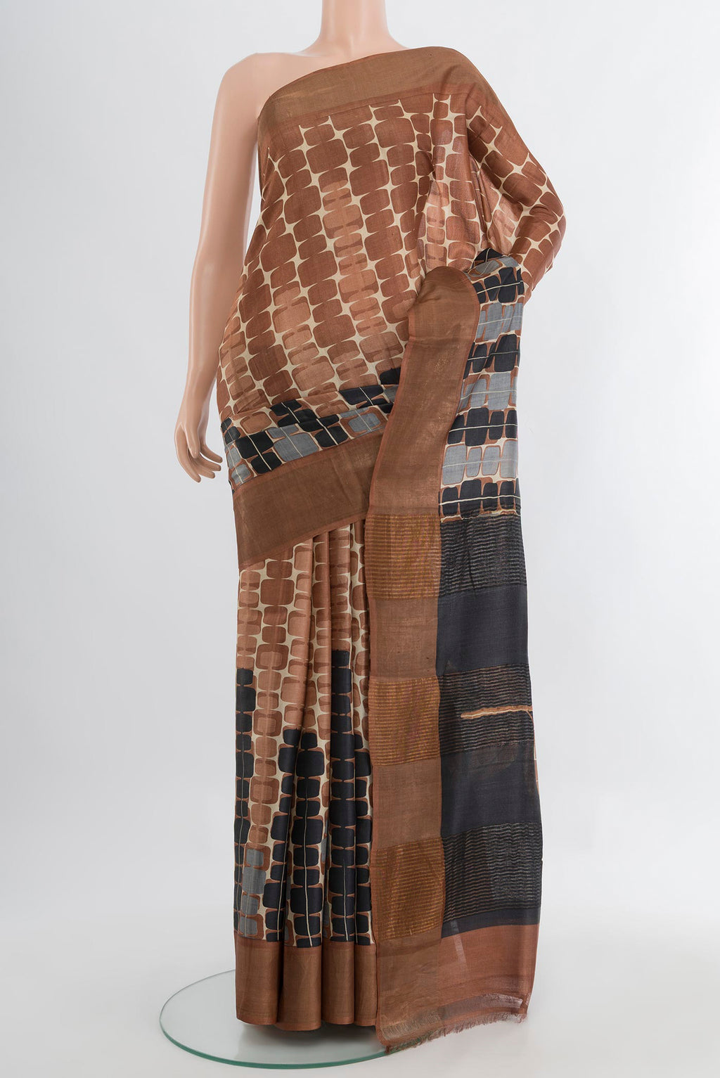 Multi Color Tussar Silk Saree with Floral Print on the body and Silk Border.  displayed on a mannequin