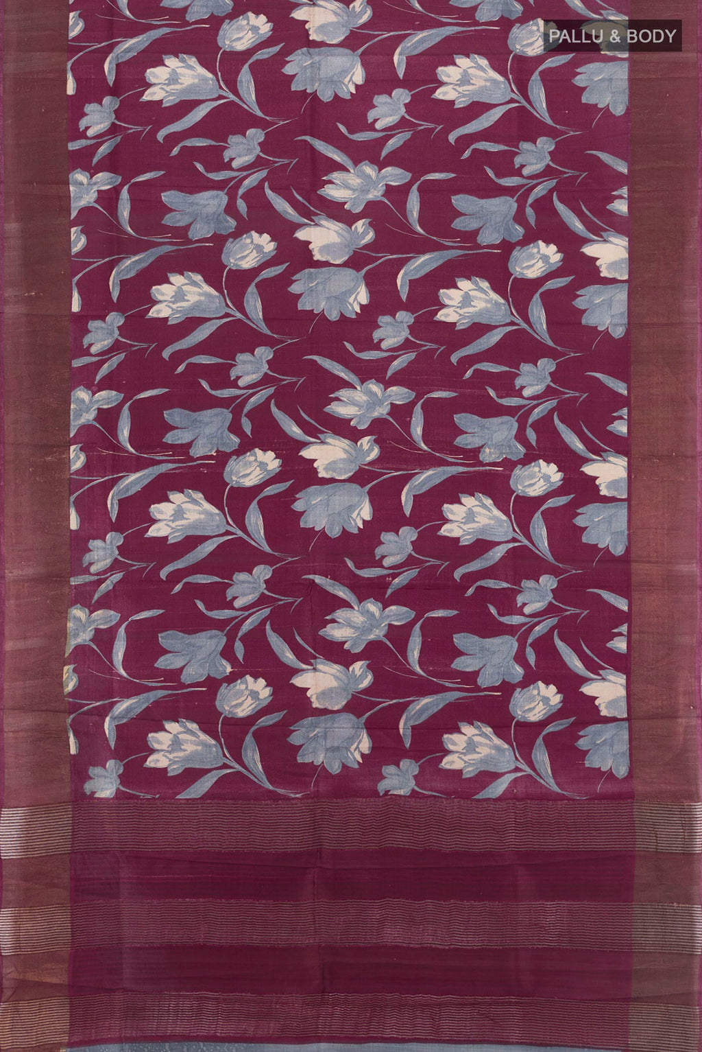 Flat view of Burgundy Tussar Silk Saree with Floral Print on the body and Zari Border. 