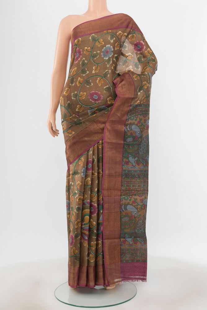 Pure Silk Pure Zari Multi Color Tussar Saree with Floral Print on the body and Silk Border.  displayed on a mannequin