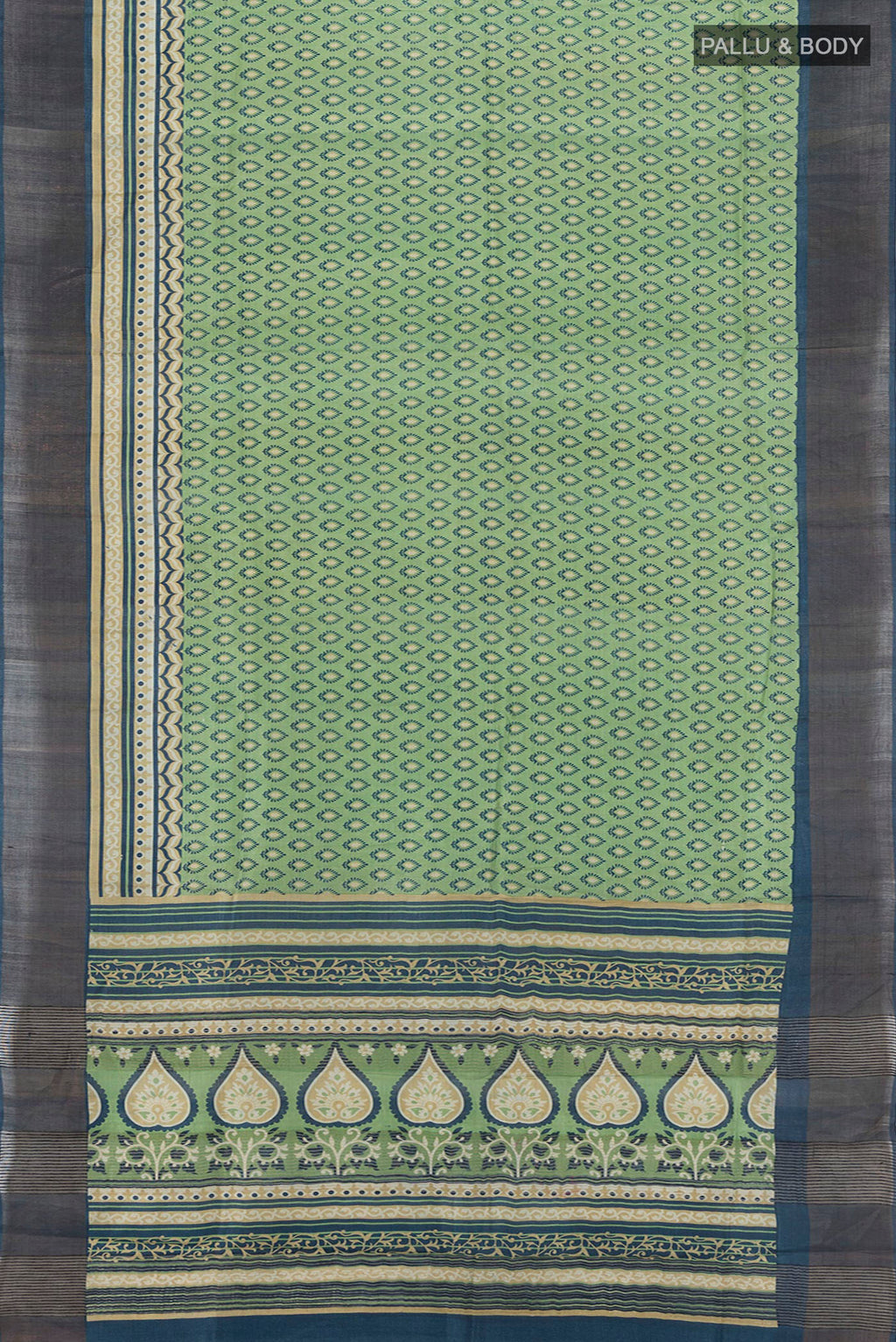 Flat view of Sage Green Tussar Silk Saree with Floral Print on the body and Zari Border. 