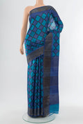 Pure Silk Pure Zari Multi Color Tussar Saree with Floral Print on the body and Silk Border.  displayed on a mannequin