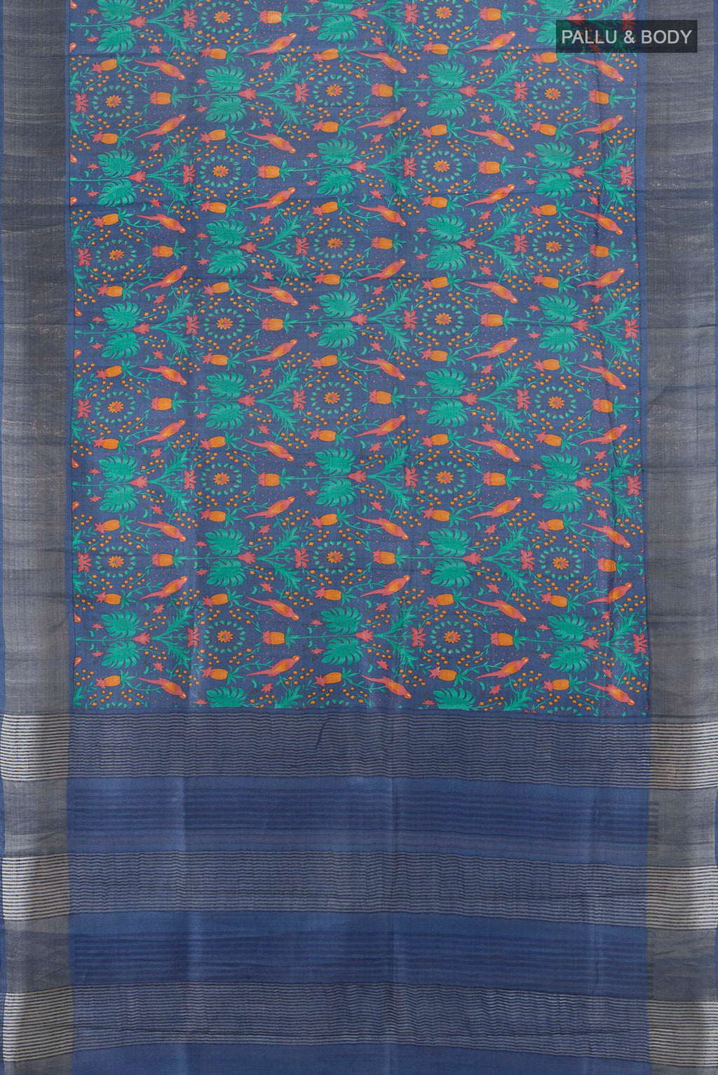 Flat view of Blue Tussar Silk Saree with Floral Print on the body and Zari Border. 