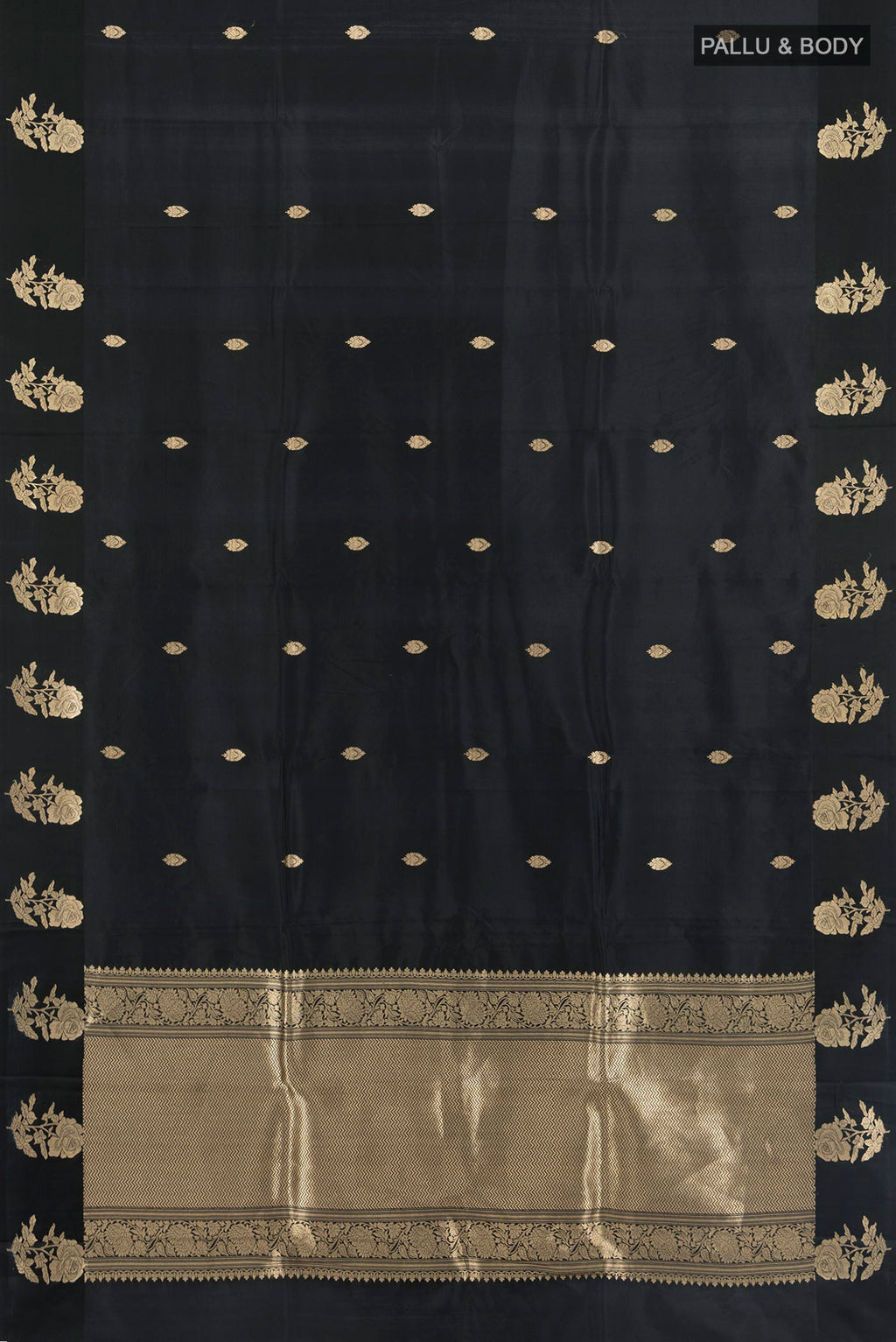 Flat view of Black Banarasi Katan Silk Saree with Zari Butta on the body and Fancy Border. 