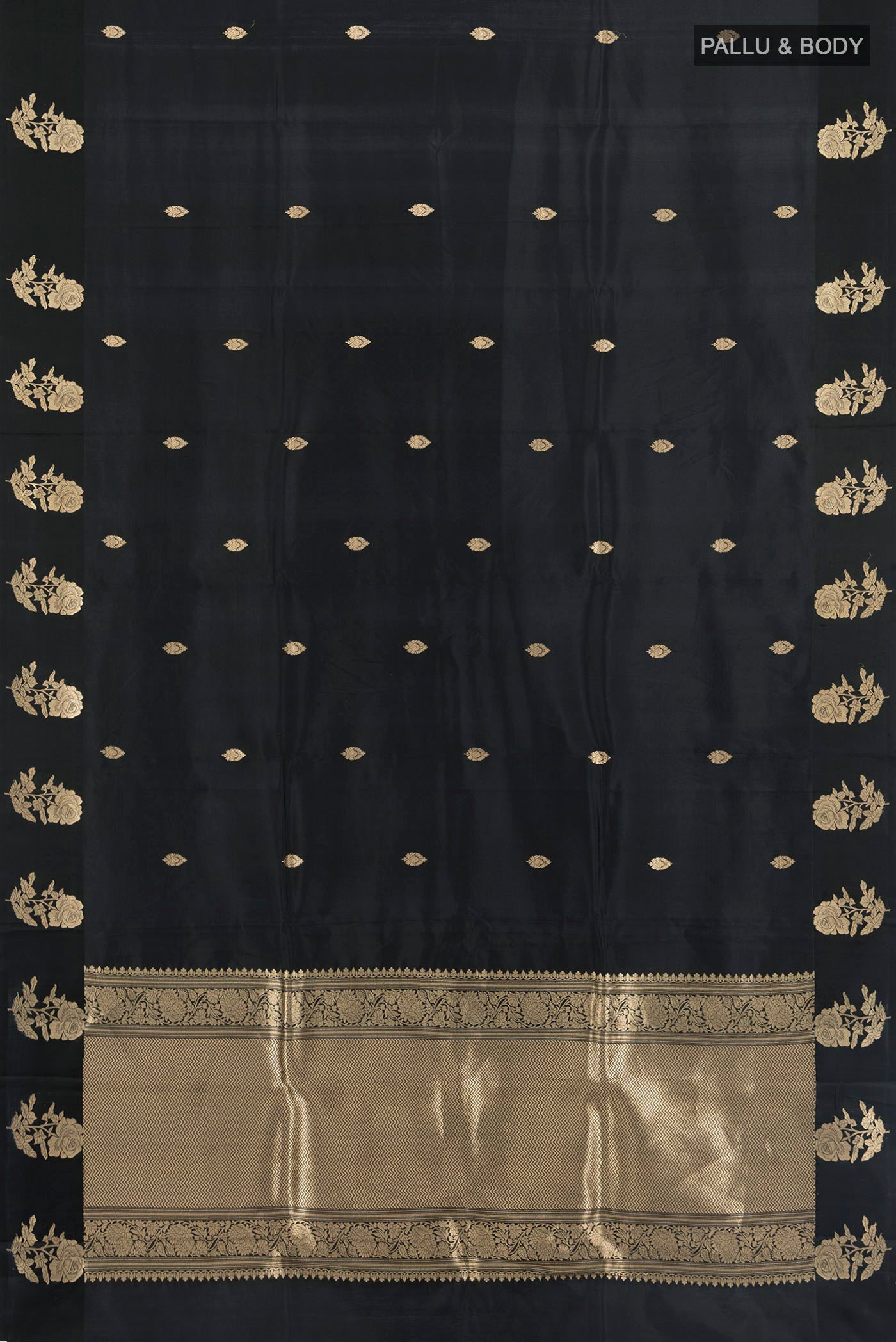 Flat view of Black Banarasi Katan Silk Saree with Zari Butta on the body and Fancy Border. 