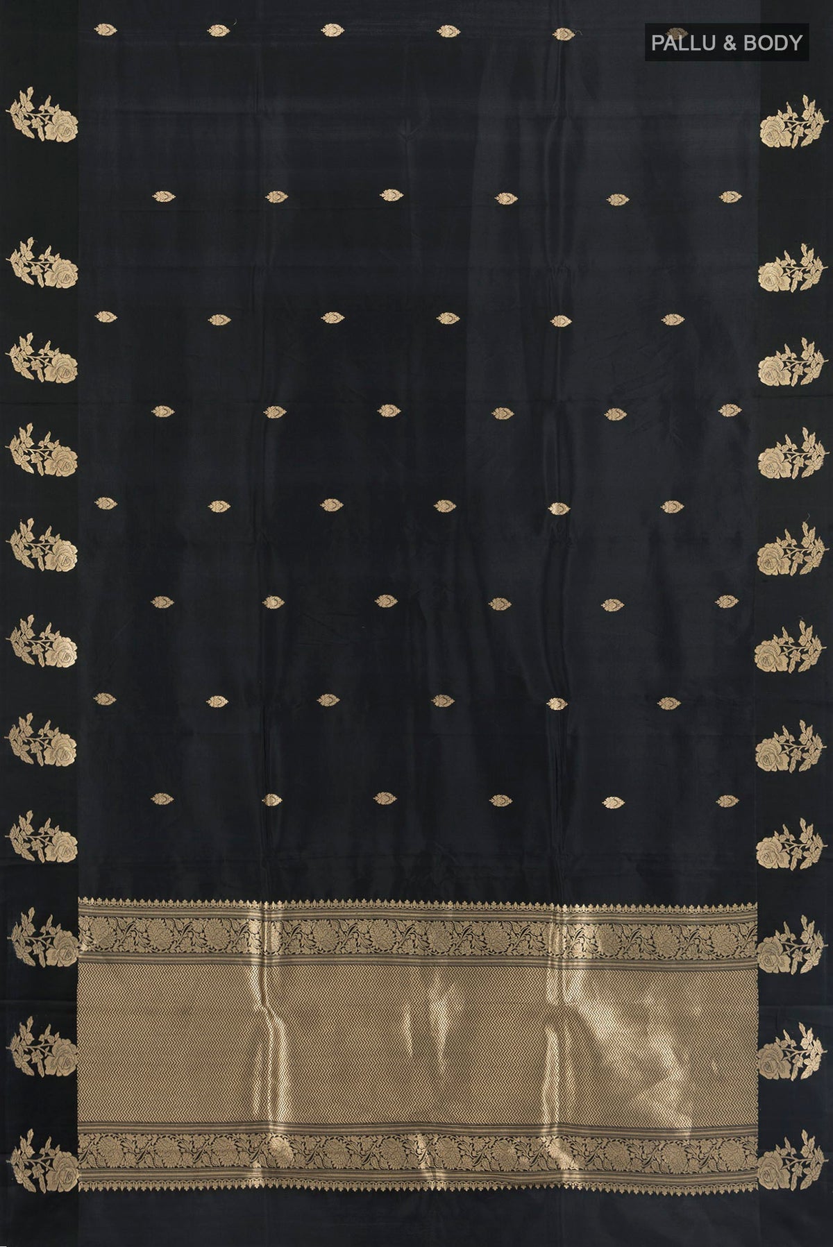 Flat view of Black Banarasi Katan Silk Saree with Zari Butta on the body and Fancy Border. 