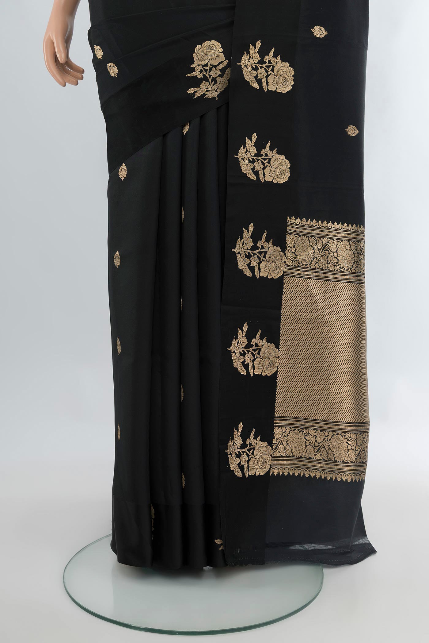 Pleats and pallu of Black Banarasi Katan Silk Saree with Zari Butta on the body and Fancy Border. 