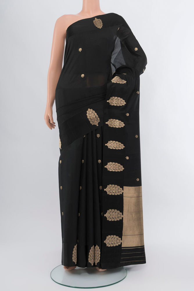 Black Banarasi Katan Silk Saree with Zari Butta on the body and Silk Border.  displayed on a mannequin