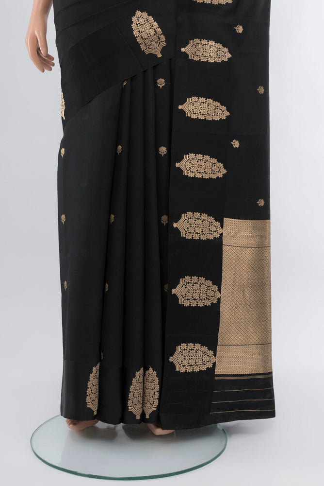Pleats and pallu of Black Banarasi Katan Silk Saree with Zari Butta on the body and Silk Border. 