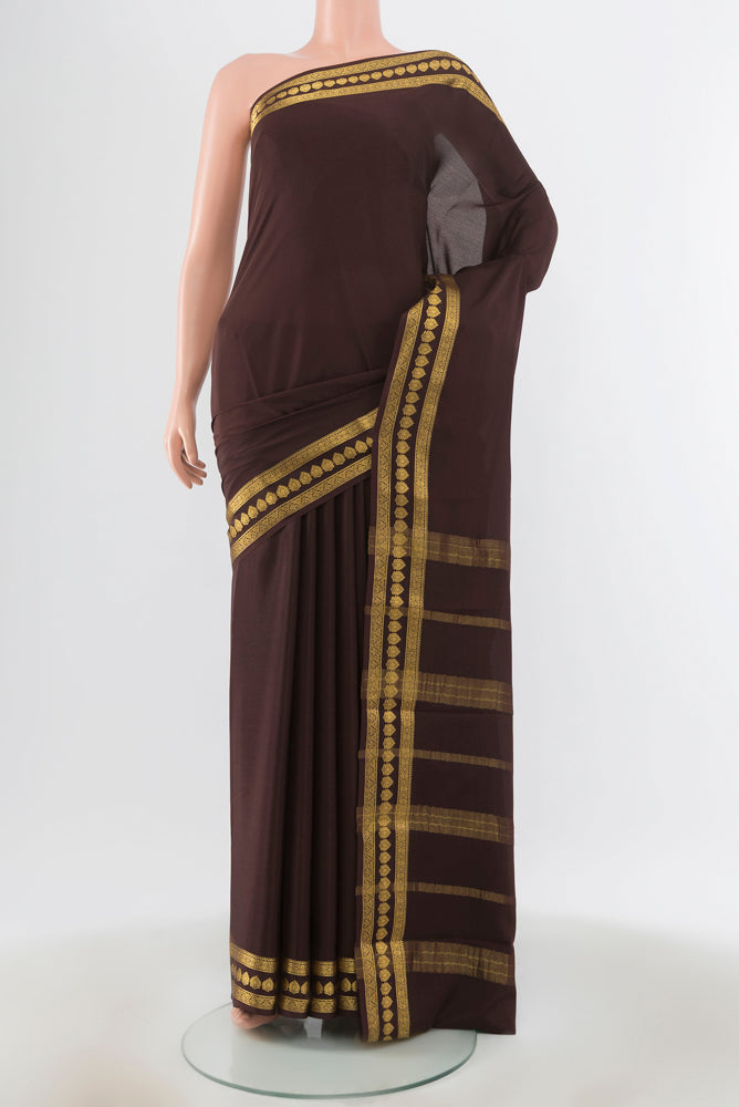 Coffee Brown Mysore Crepe Saree with Plain Body and Silk Border.  displayed on a mannequin