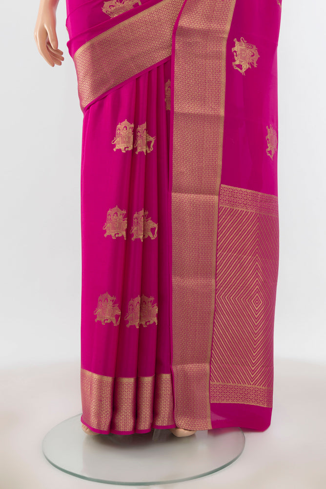 Pleats and pallu of Magenta Mysore Crepe Saree with Plain Body and Silk Border. 