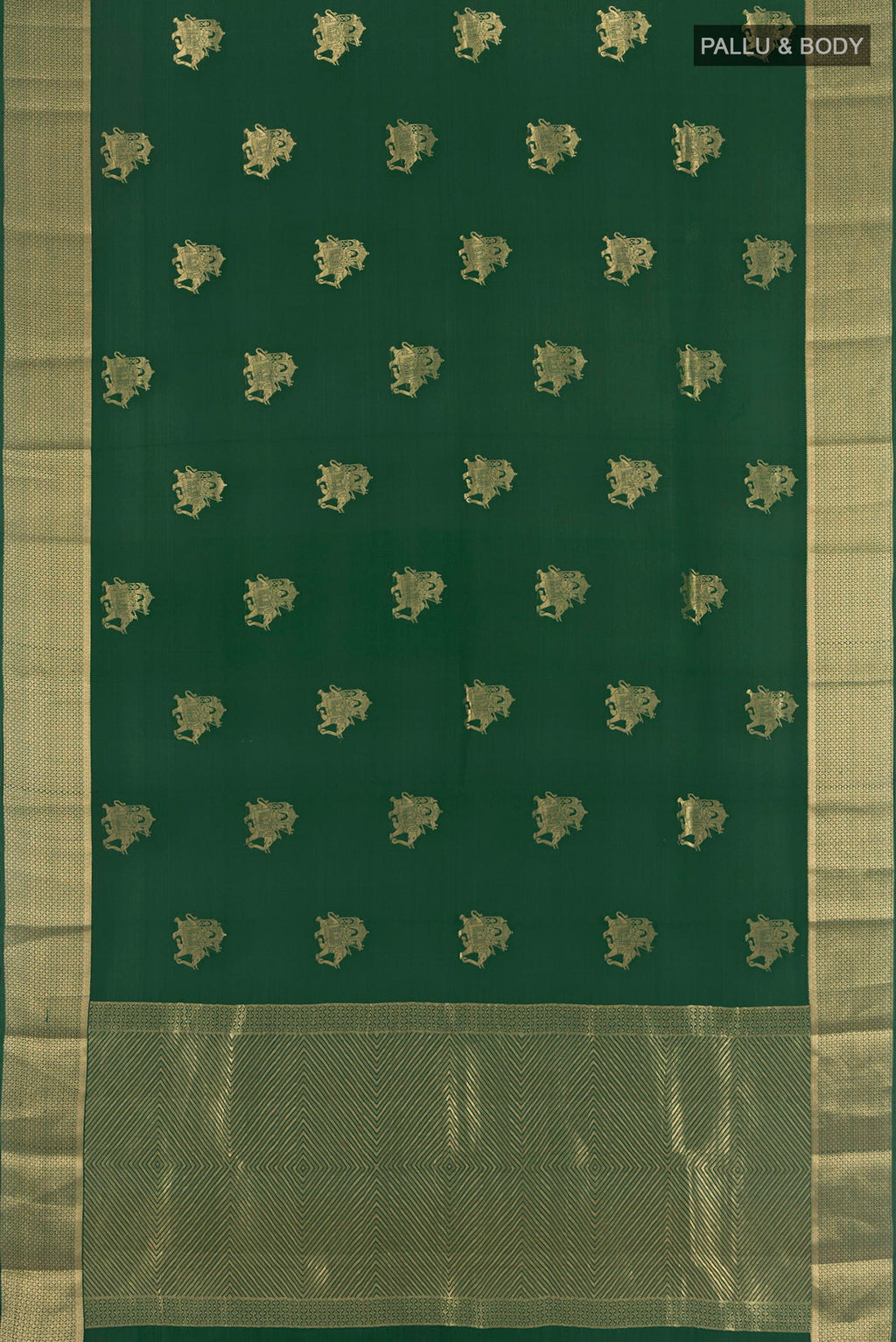 Flat view of Bottle Green Mysore Crepe Saree with Zari Butta on the body and Zari Border. 