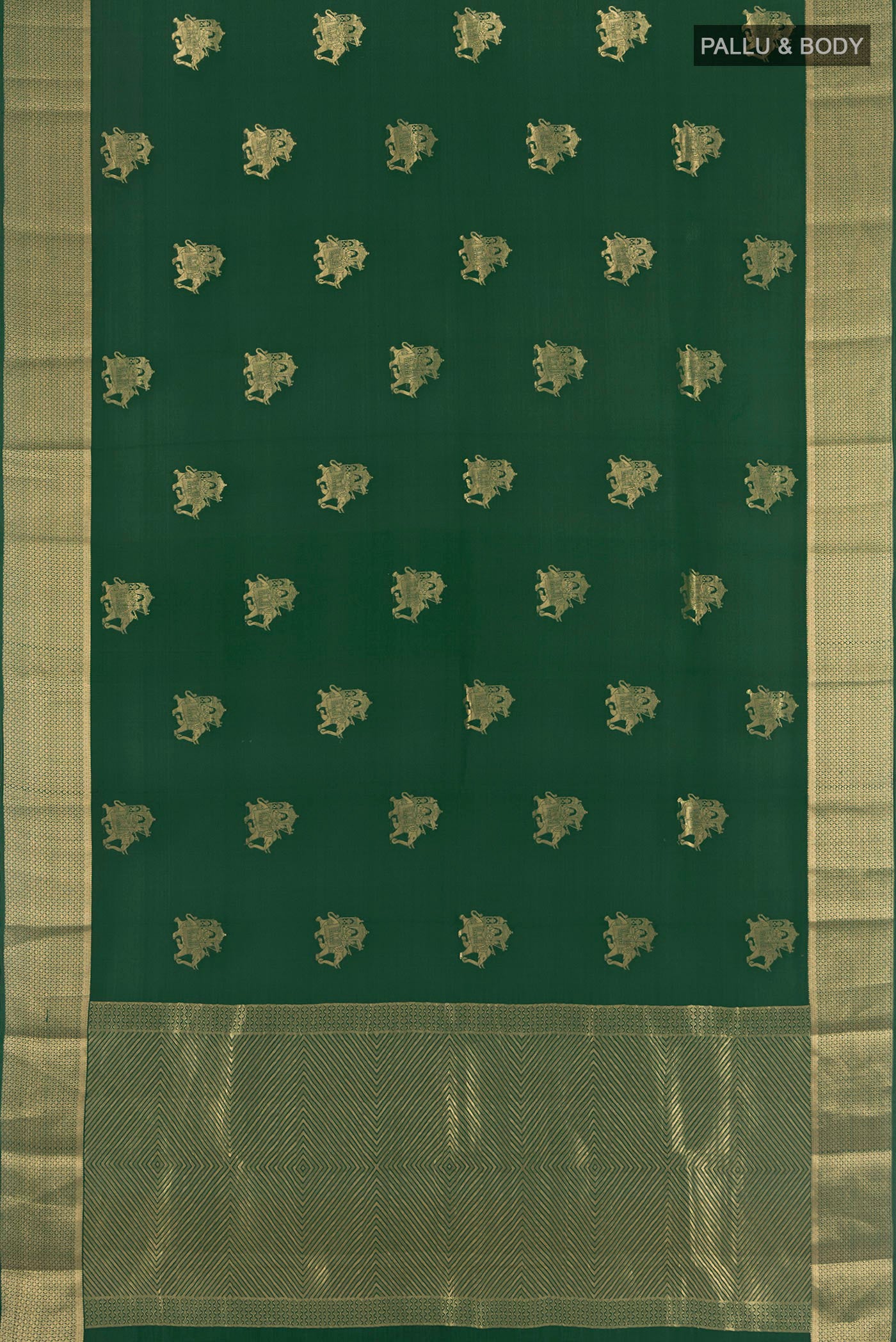 Flat view of Bottle Green Mysore Crepe Saree with Zari Butta on the body and Zari Border. 