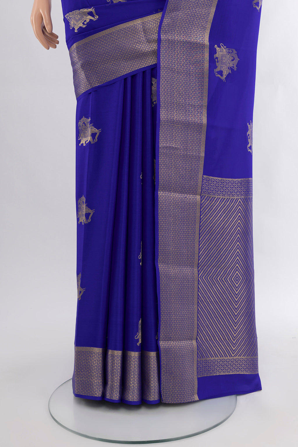 Pleats and pallu of Royal Blue Mysore Crepe Saree with Zari Butta on the body and Zari Border. 