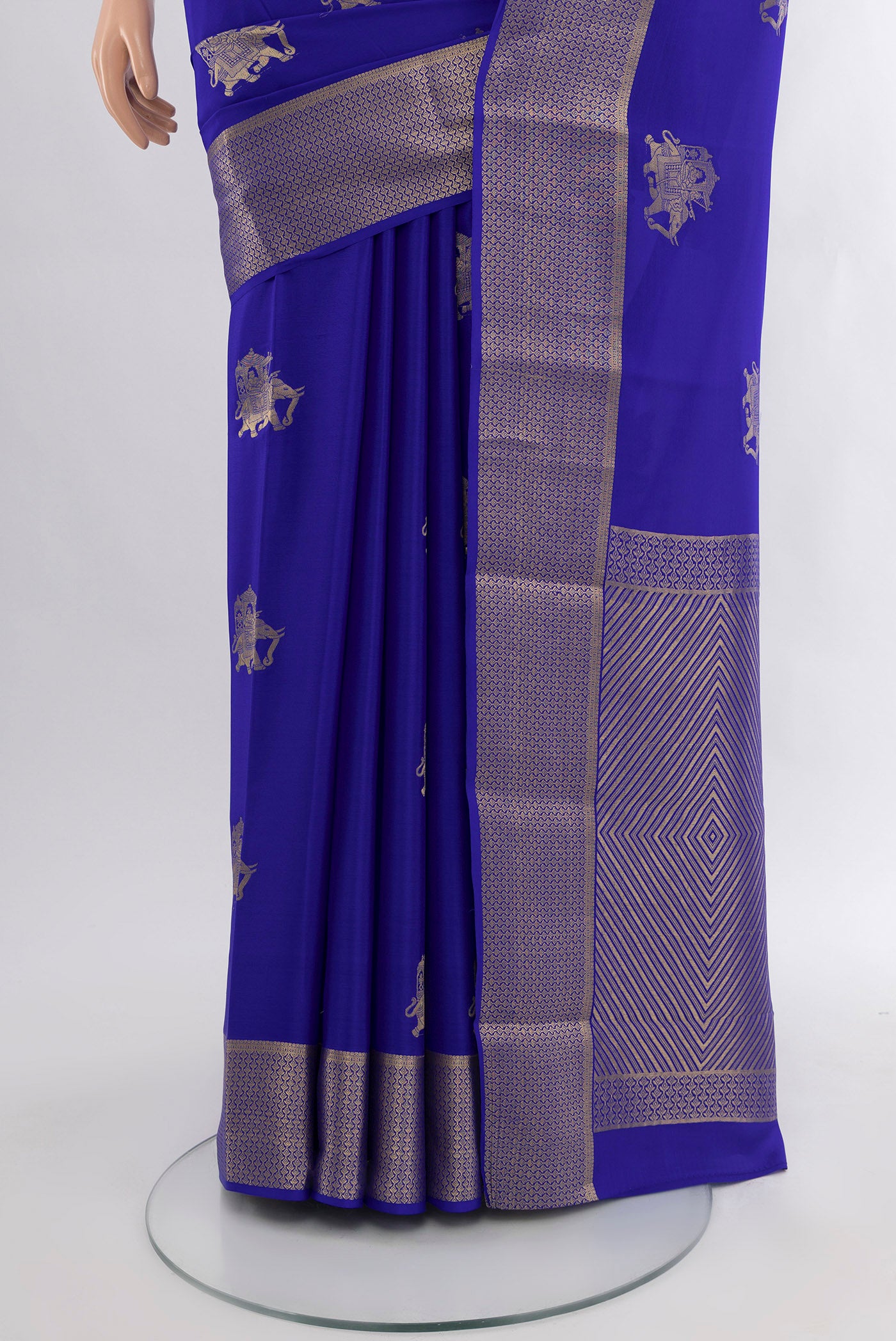 Pleats and pallu of Royal Blue Mysore Crepe Saree with Zari Butta on the body and Zari Border. 
