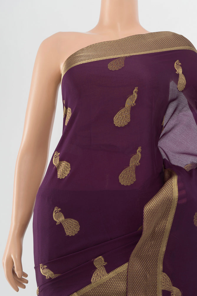 Border image of Pure Silk Pure Zari Violet Mysore Crepe Saree with Zari Butta on the body and Silk Border. 