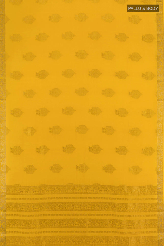 Flat view of Yellow Mysore Crepe Saree with Zari Butta on the body and Silk Border. 