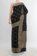 Black Mysore Crepe Saree with Zari Butta on the body and Zari Border.  displayed on a mannequin