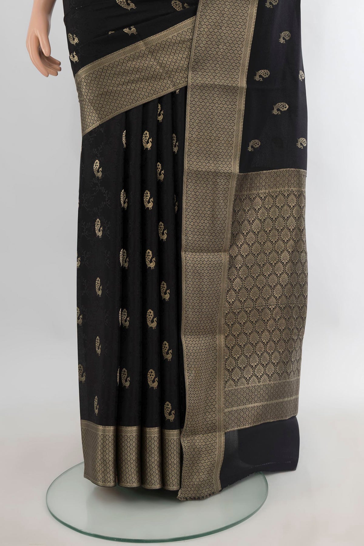 Pleats and pallu of Black Mysore Crepe Saree with Zari Butta on the body and Zari Border. 