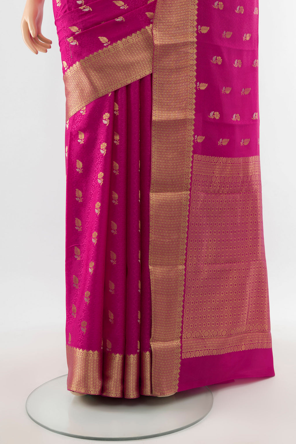 Pleats and pallu of Purple Mysore Crepe Saree with Zari Butta on the body and Silk Border. 
