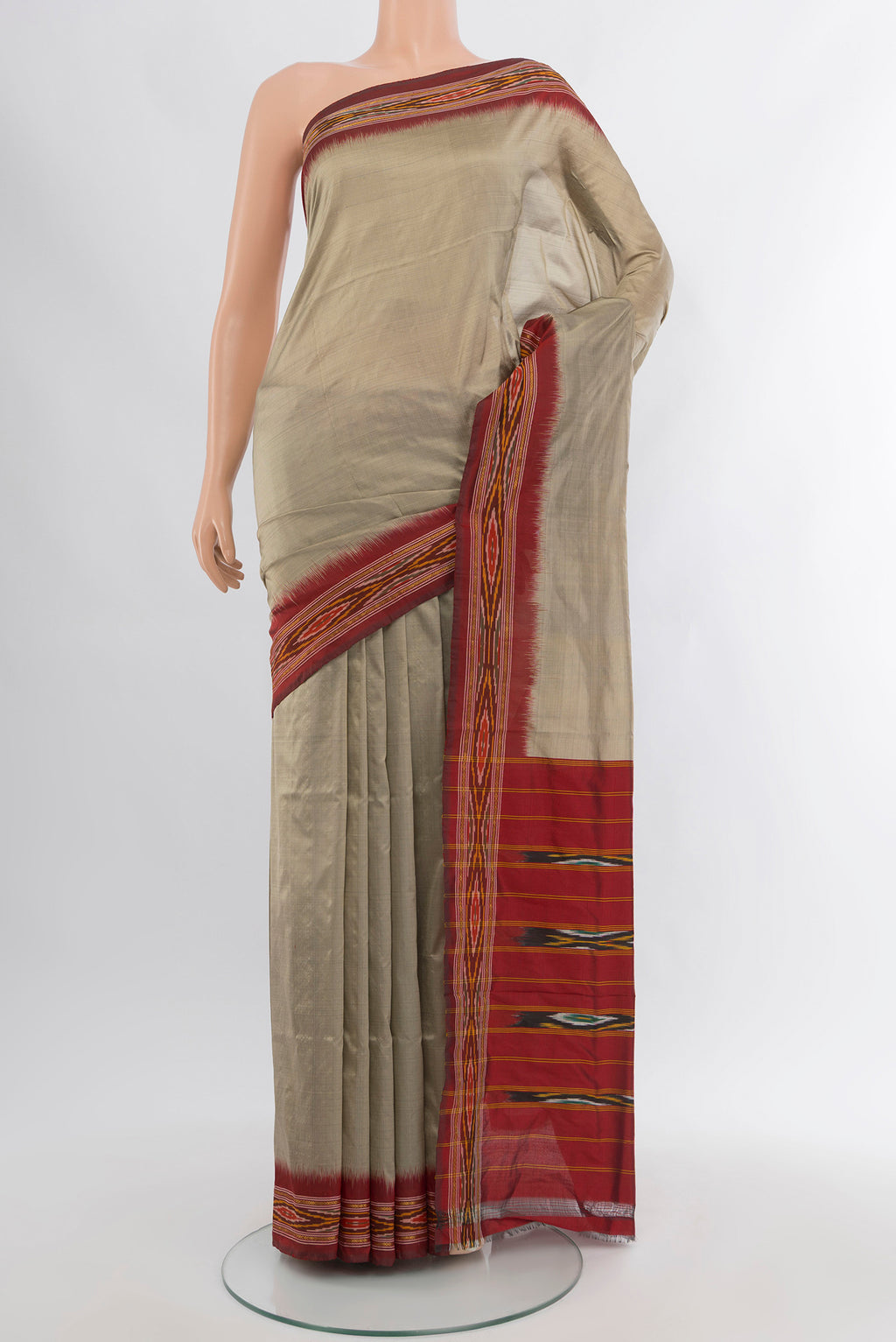 Grey Pochampally Silk Saree with Plain Body and Ikat Border.  displayed on a mannequin