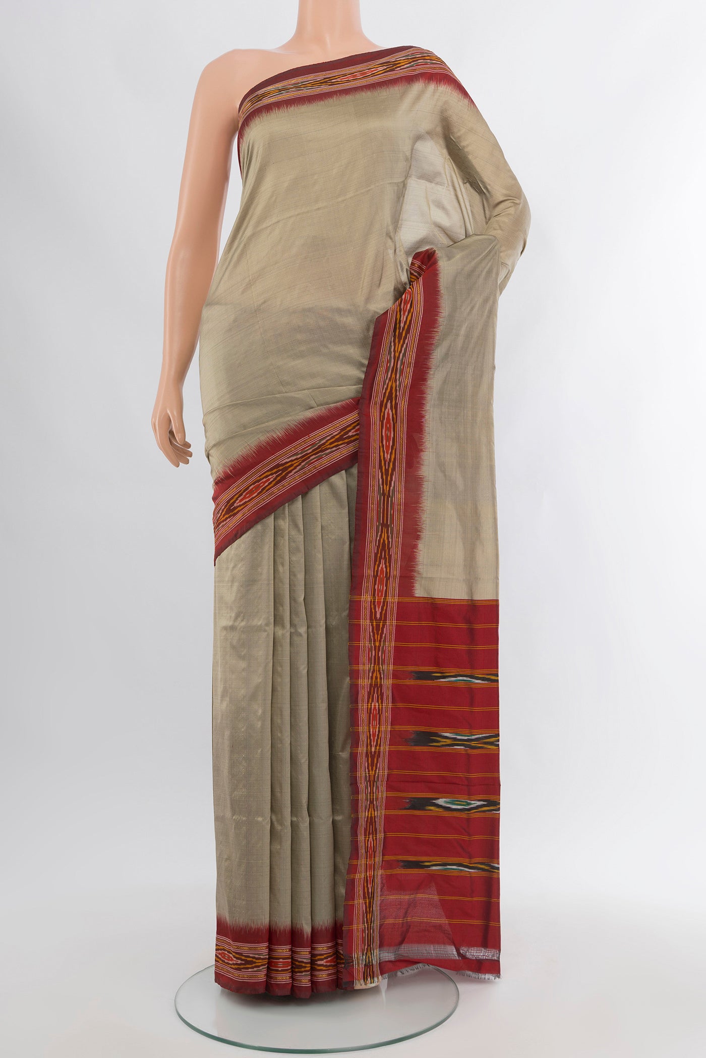 Grey Pochampally Silk Saree with Plain Body and Ikat Border.  displayed on a mannequin