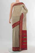 Pure Silk Grey Pochampally Saree with Plain Body and Ikat Border.  displayed on a mannequin