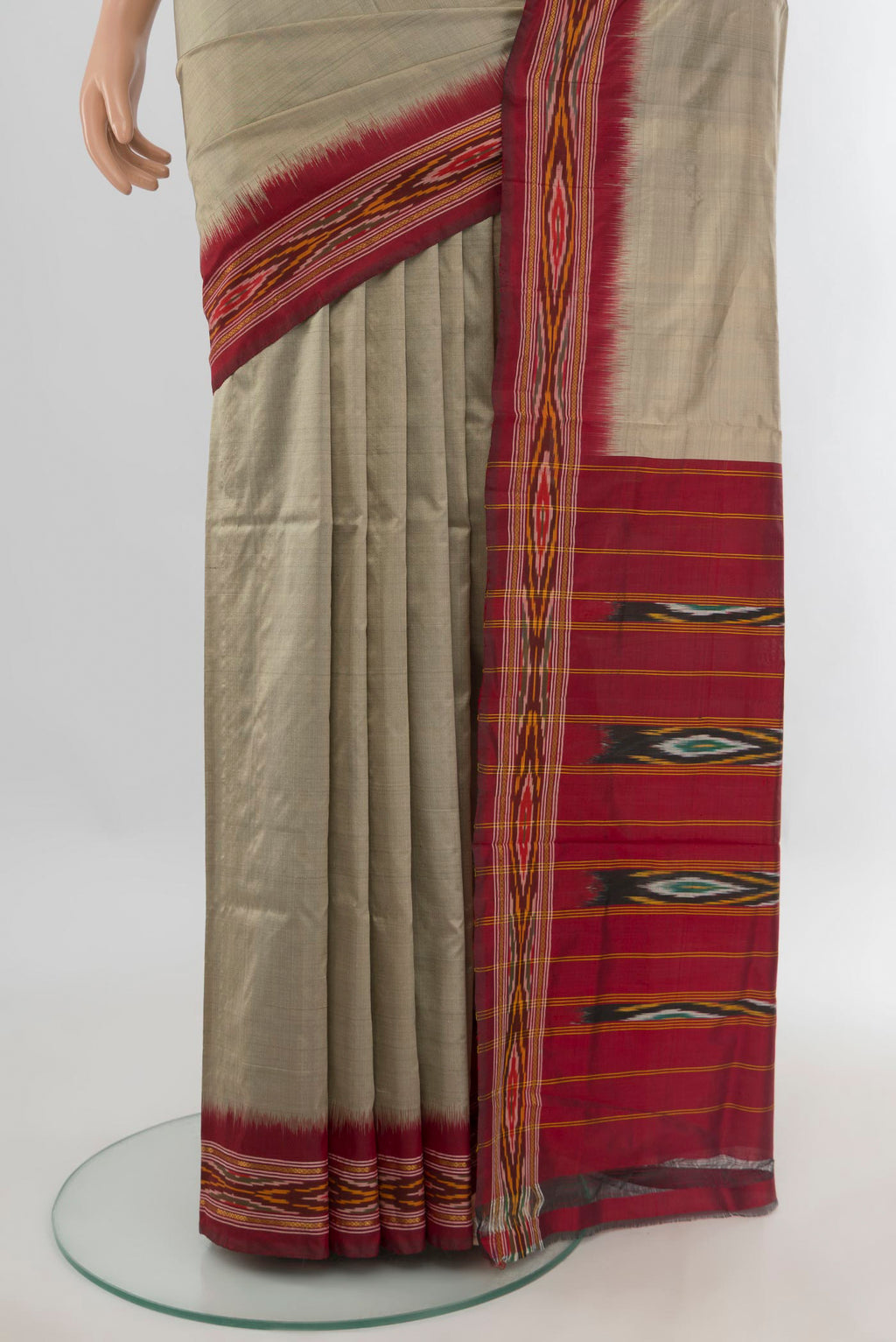 Pleats and pallu of Pure Silk Grey Pochampally Saree with Plain Body and Ikat Border. 